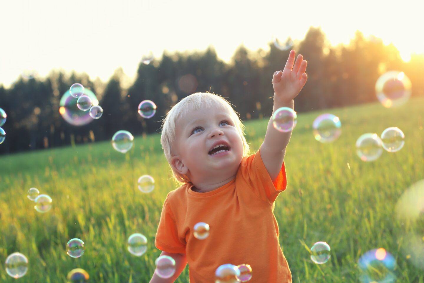 Summer means change. Make the transition easy for your toddler. toddler enjoying summer outside