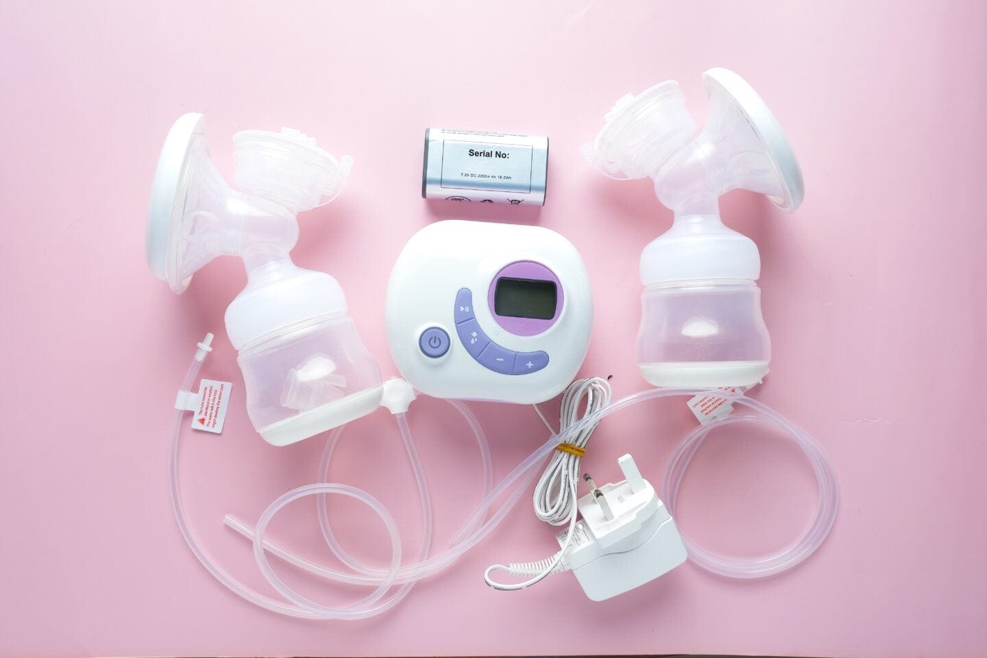 New breast pump cleaning guidelines for working moms: Experts clear up confusion Breast pump parts displayed on pink background
