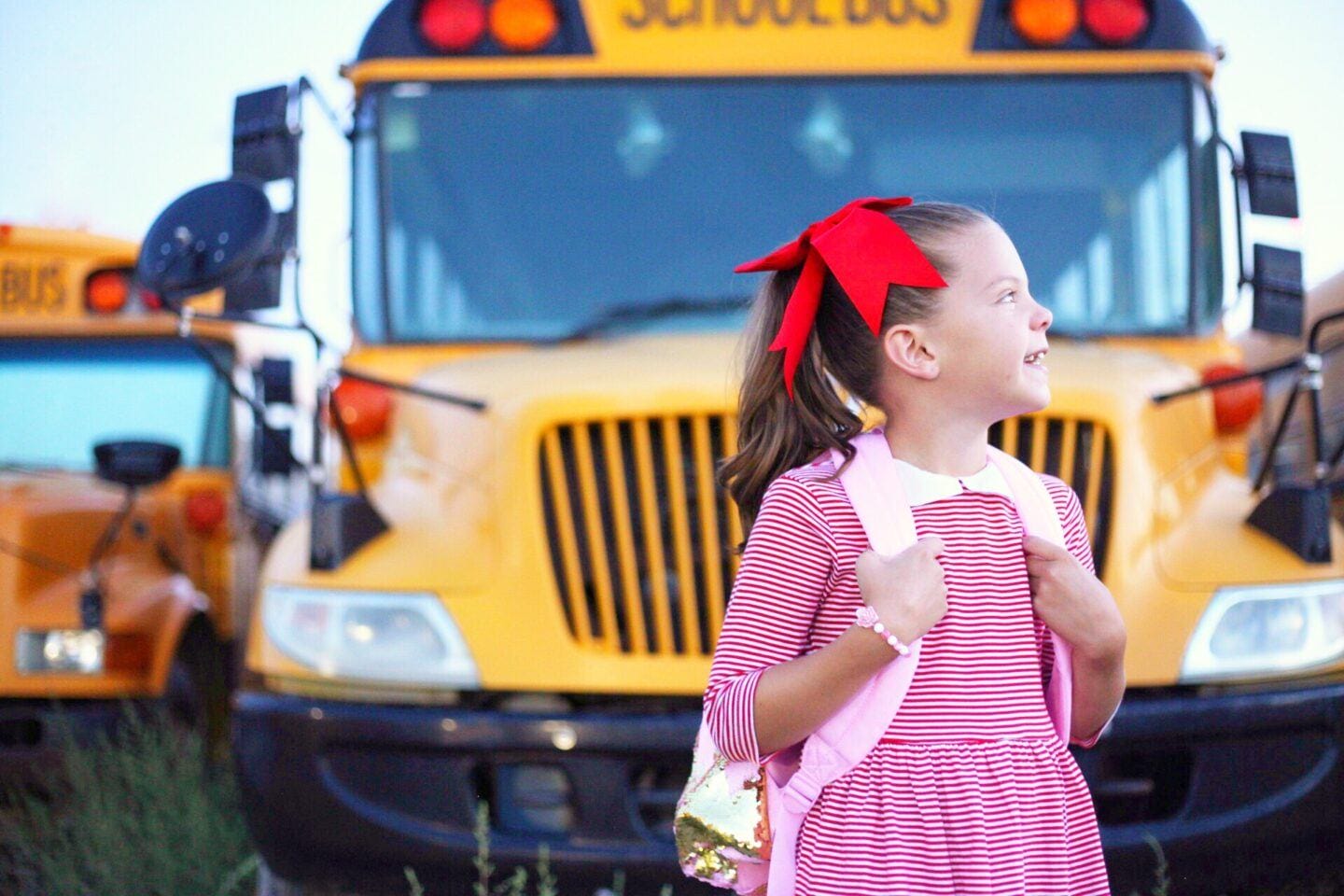 Prepping for the Kindergarten Transition kindergartener waiting for bus