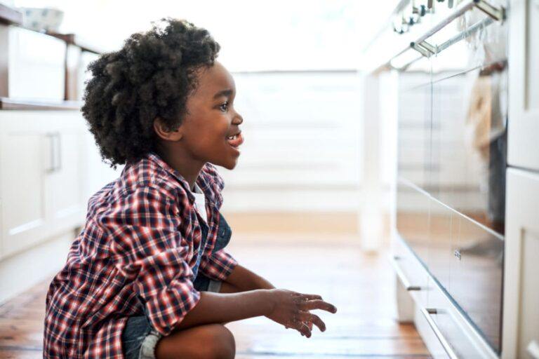 50 questions to get your kid thinking like a scientist child looking at an oven