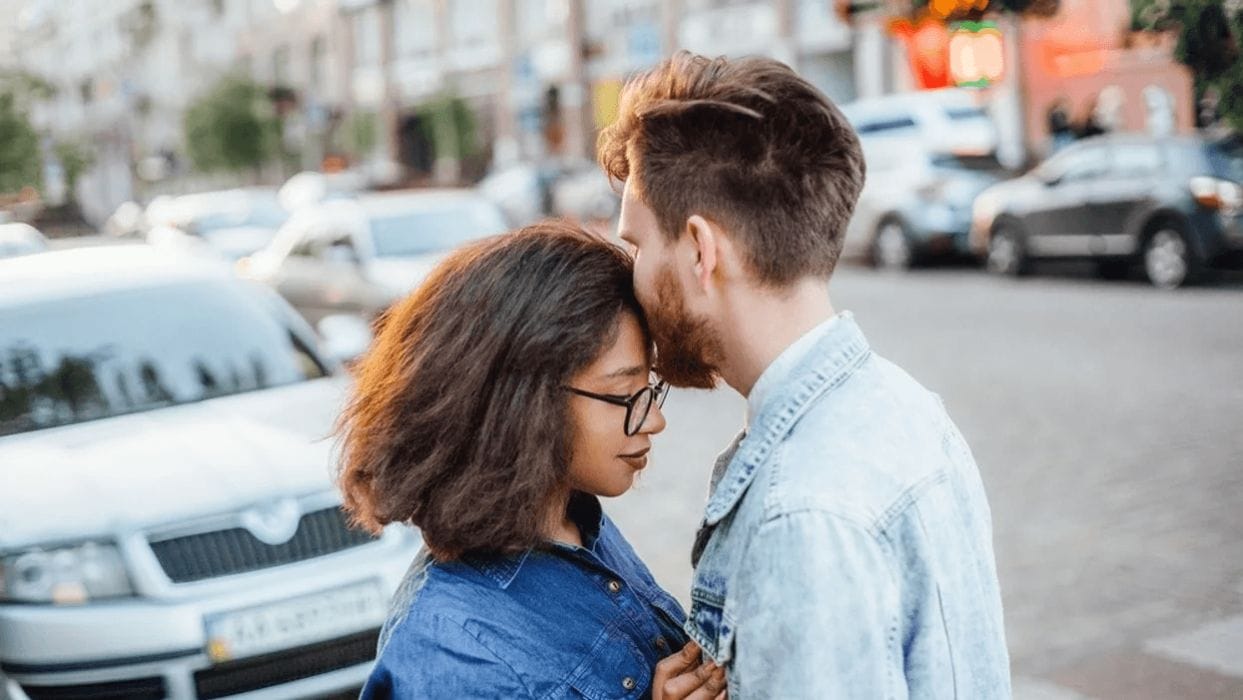 Dear husband: I am all in, forever man kissing woman on forehead