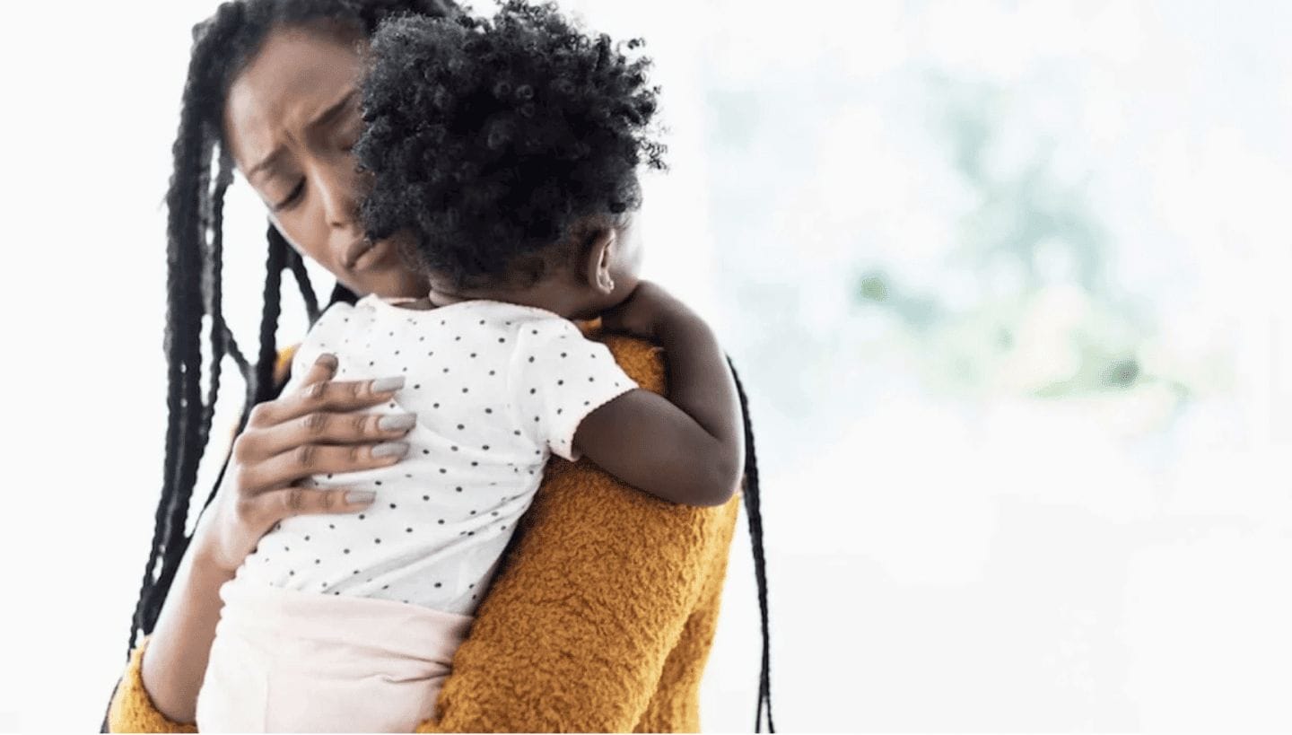 Sometimes babies cry just to release stress—and it’s good for them mom comforting baby on shoulder
