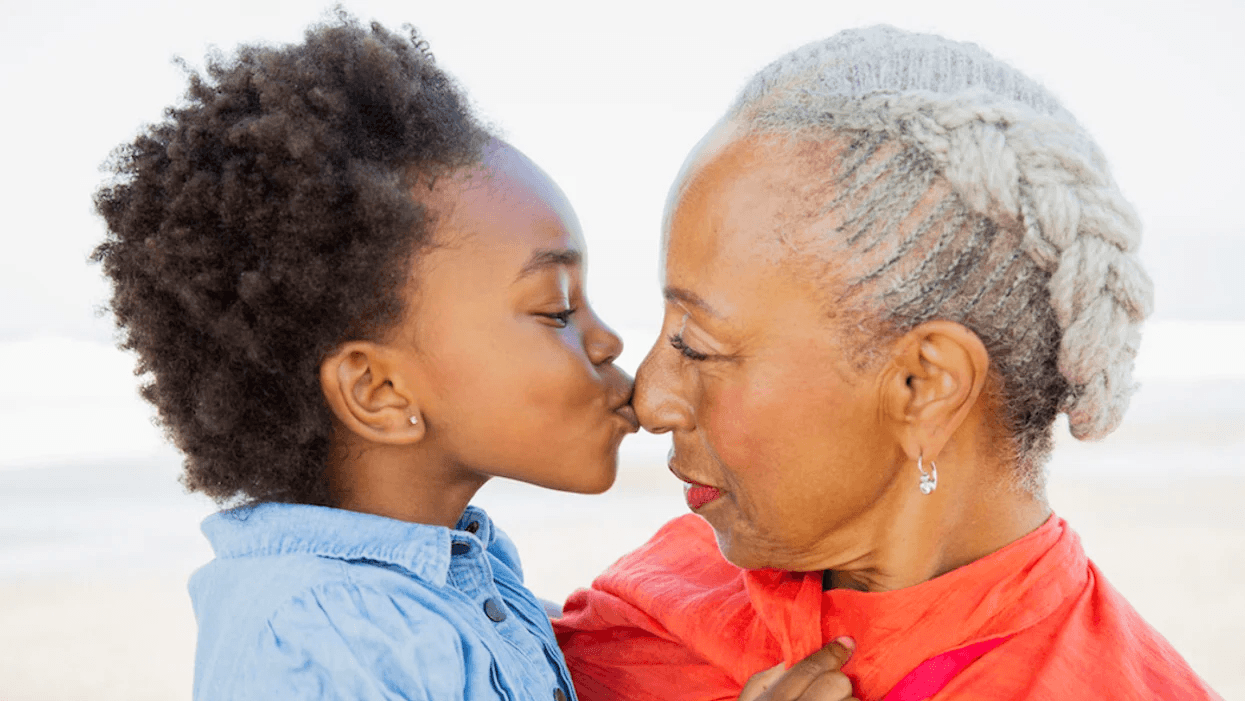 Our kids have the best Nana and Grandma in the world—thank you child kissing grandma on the nose