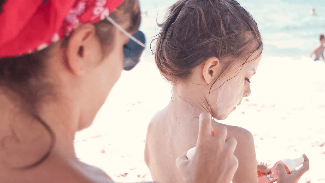 8 summer skincare myths debunked mom putting sunscreen on a little girl