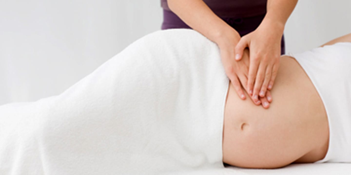 Best prenatal massages in NYC A pregnant woman getting a massage