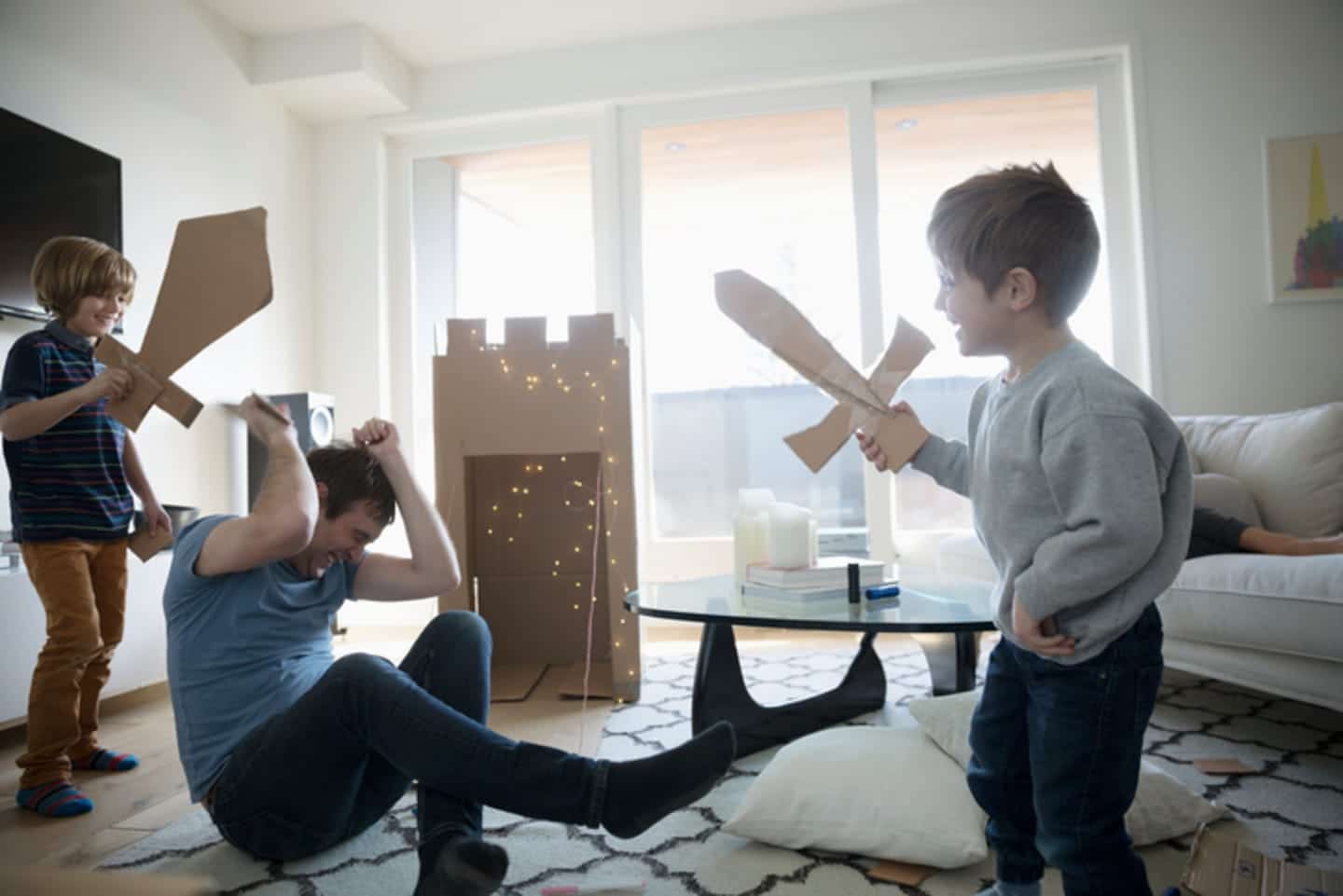 Fatherhood has a huge impact on your happiness, studies say Father playing with his kids