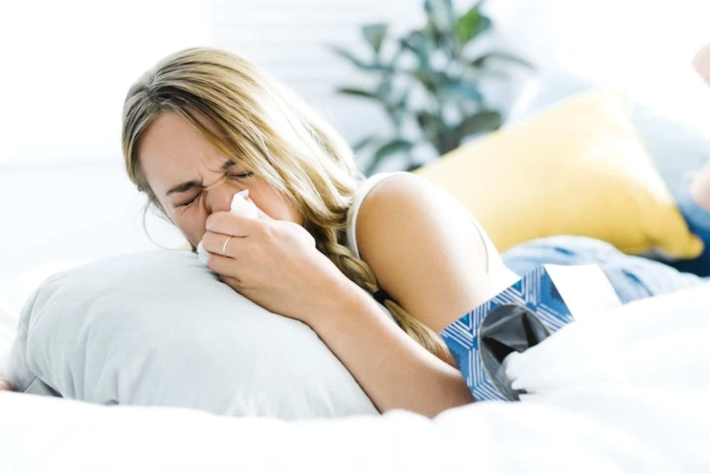 Almost half of women over 30 don’t make time for their own health, says new survey woman blowing her nose