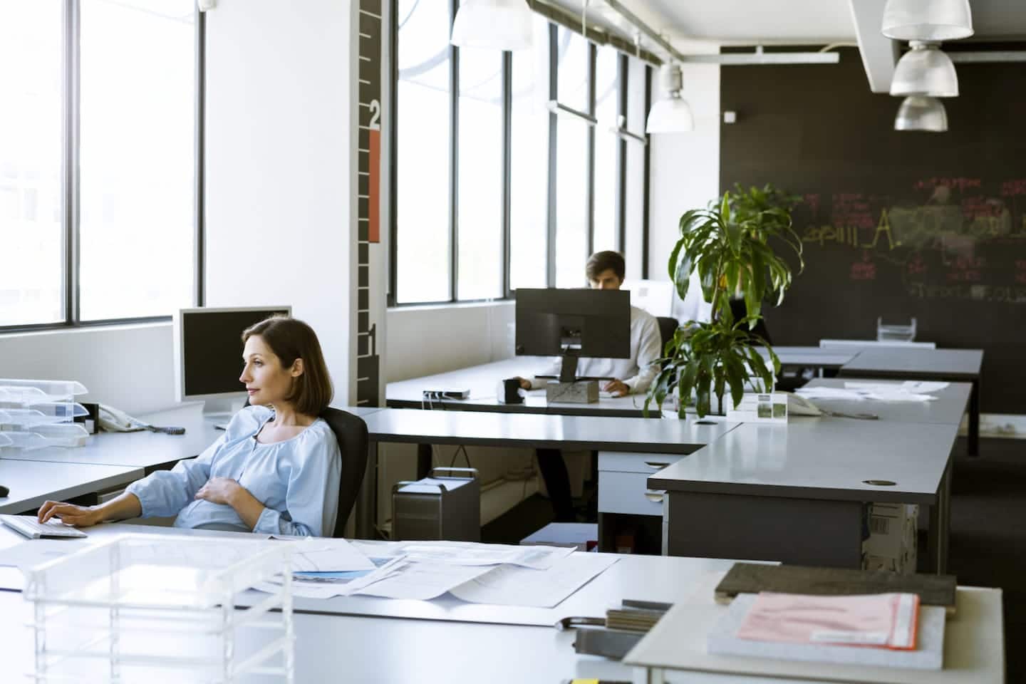 American workers are donating their paid time off to pregnant colleagues, but they shouldn’t have to pregnant woman in an office