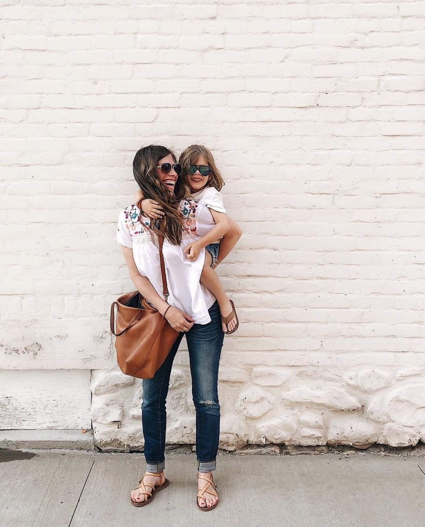 I wanted to make sure my oldest felt seen when the new baby arrived—so I did these 5 things woman carrying child