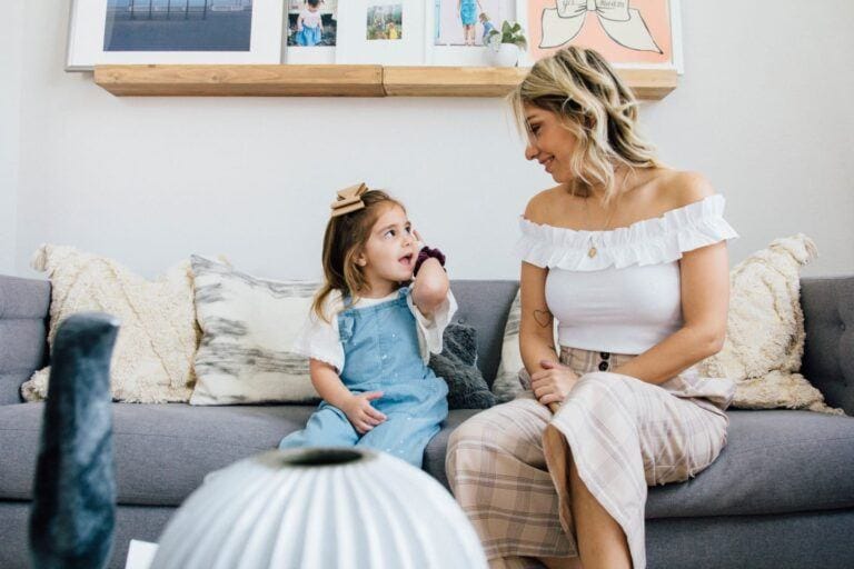 How to make your child feel powerful and heard woman sitting with child
