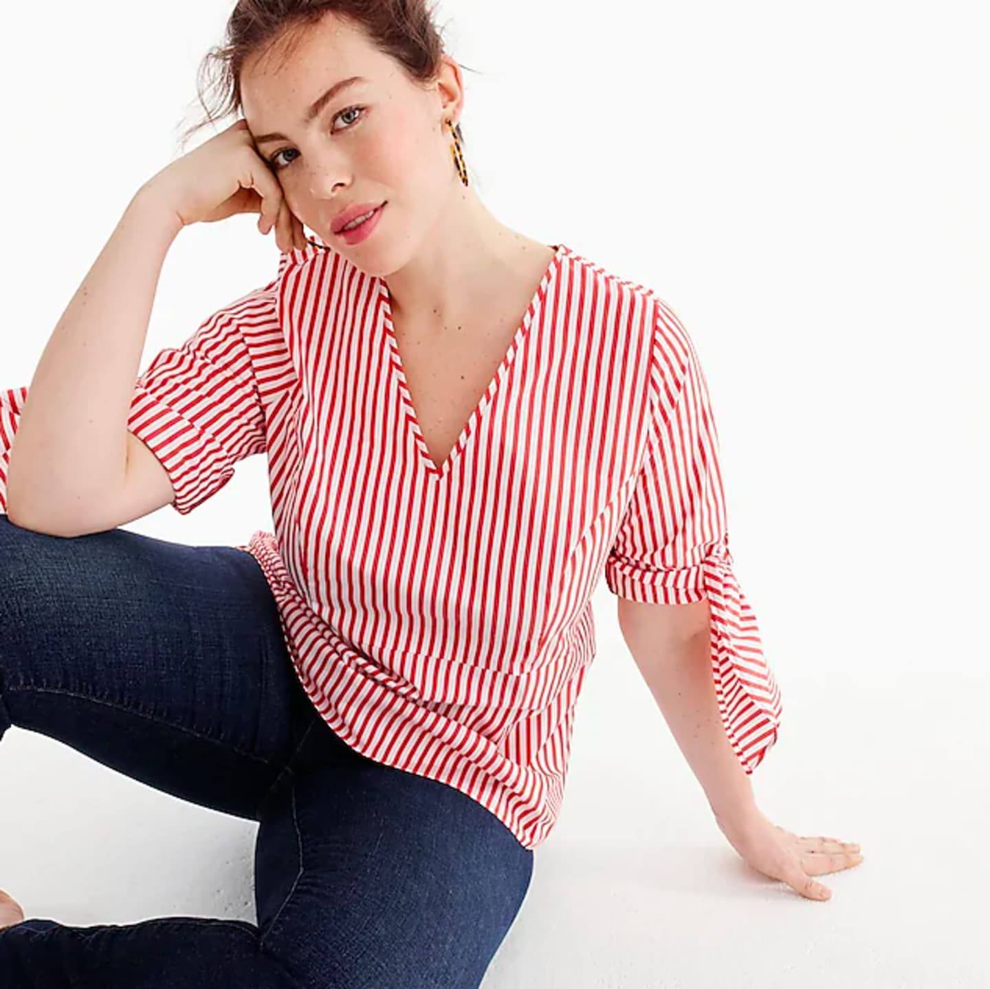 J. Crew’s new line with Universal Standard is size-inclusive—and we’re here for it 🙌 woman wearing pin stripe blouse