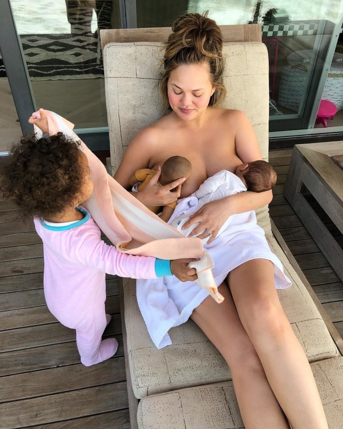 Why is Chrissy Teigen breastfeeding a doll? Child development, says research Chrissy Teigen breastfeeding child and doll