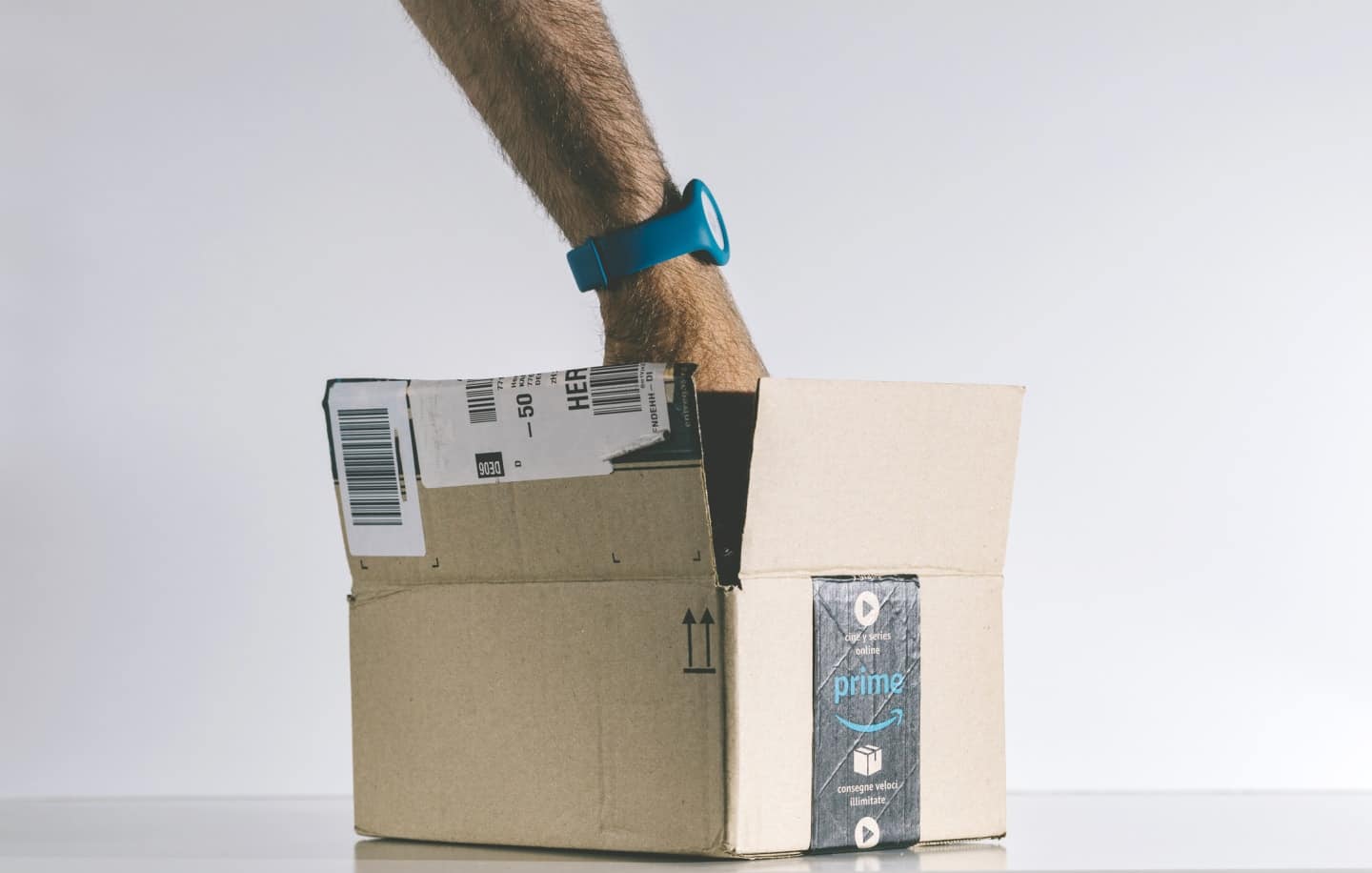 Why Prime Day 2018 will be totally different than last year hand reaching inside a box