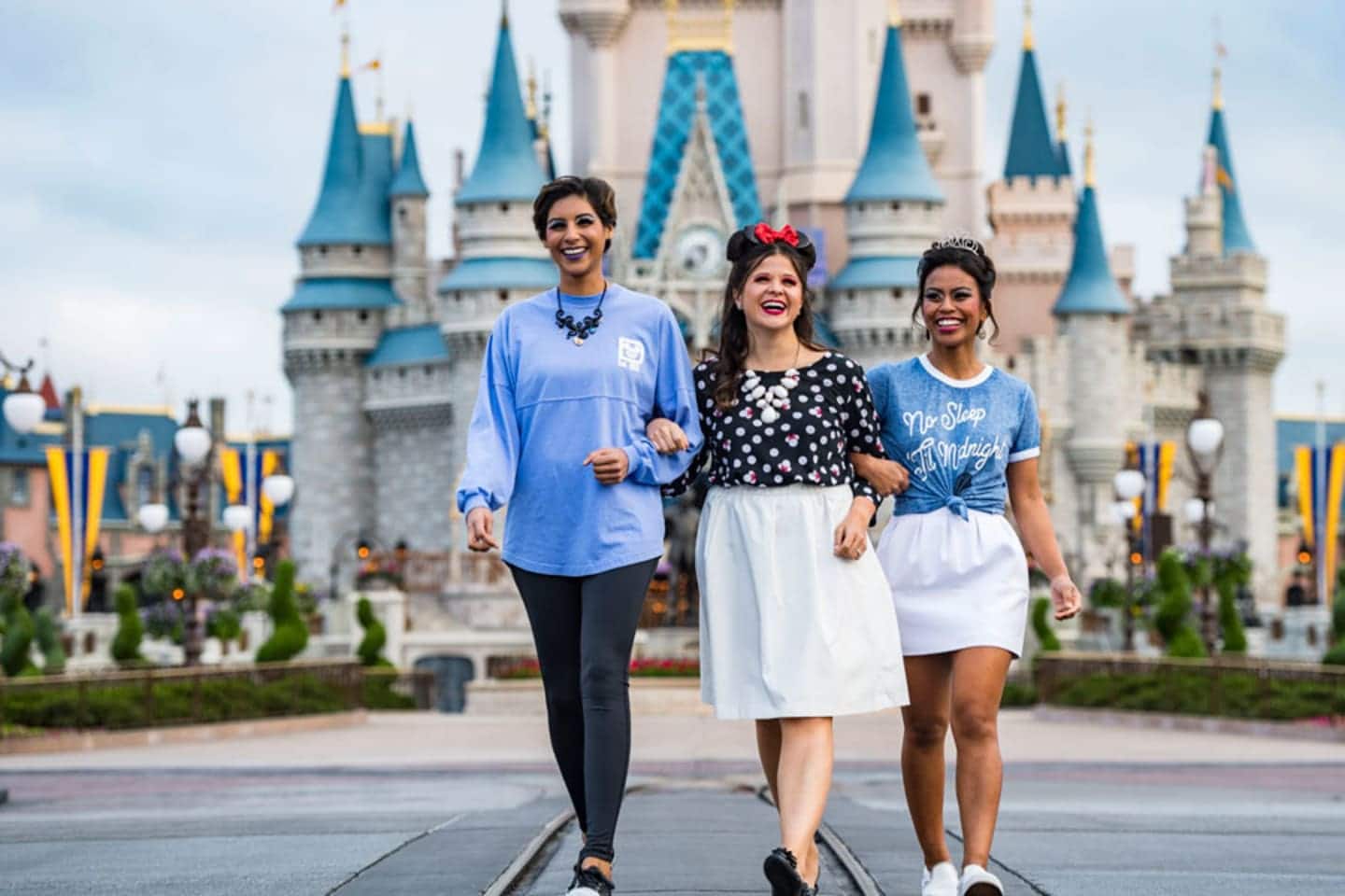 Disney World now offering moms a chance to play dress-up, too 3 women walking in Disney World