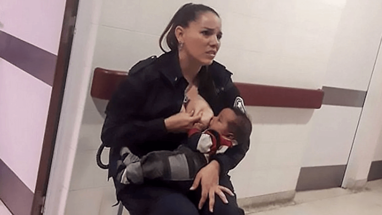 This cop breastfeeding a hungry baby is our hero female police woman breastfeeding a baby