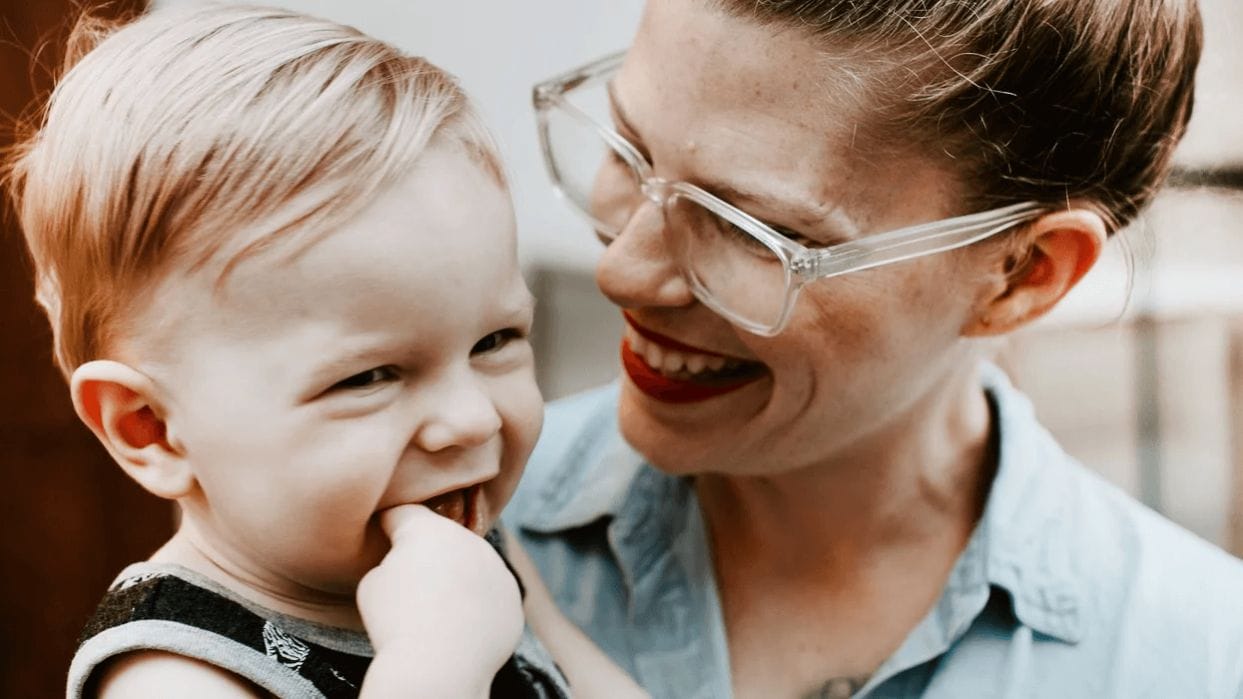 I’m not going “backwards” by choosing to stay home with my kids mom smiling at little boy