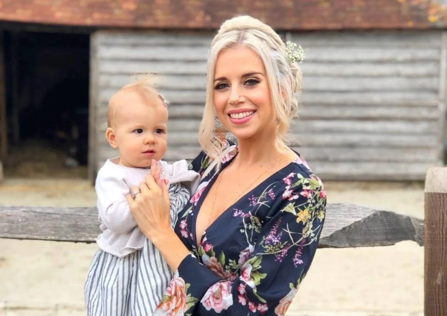 This video of a baby breathing is going viral for a very good reason mom holding baby wearing a dress