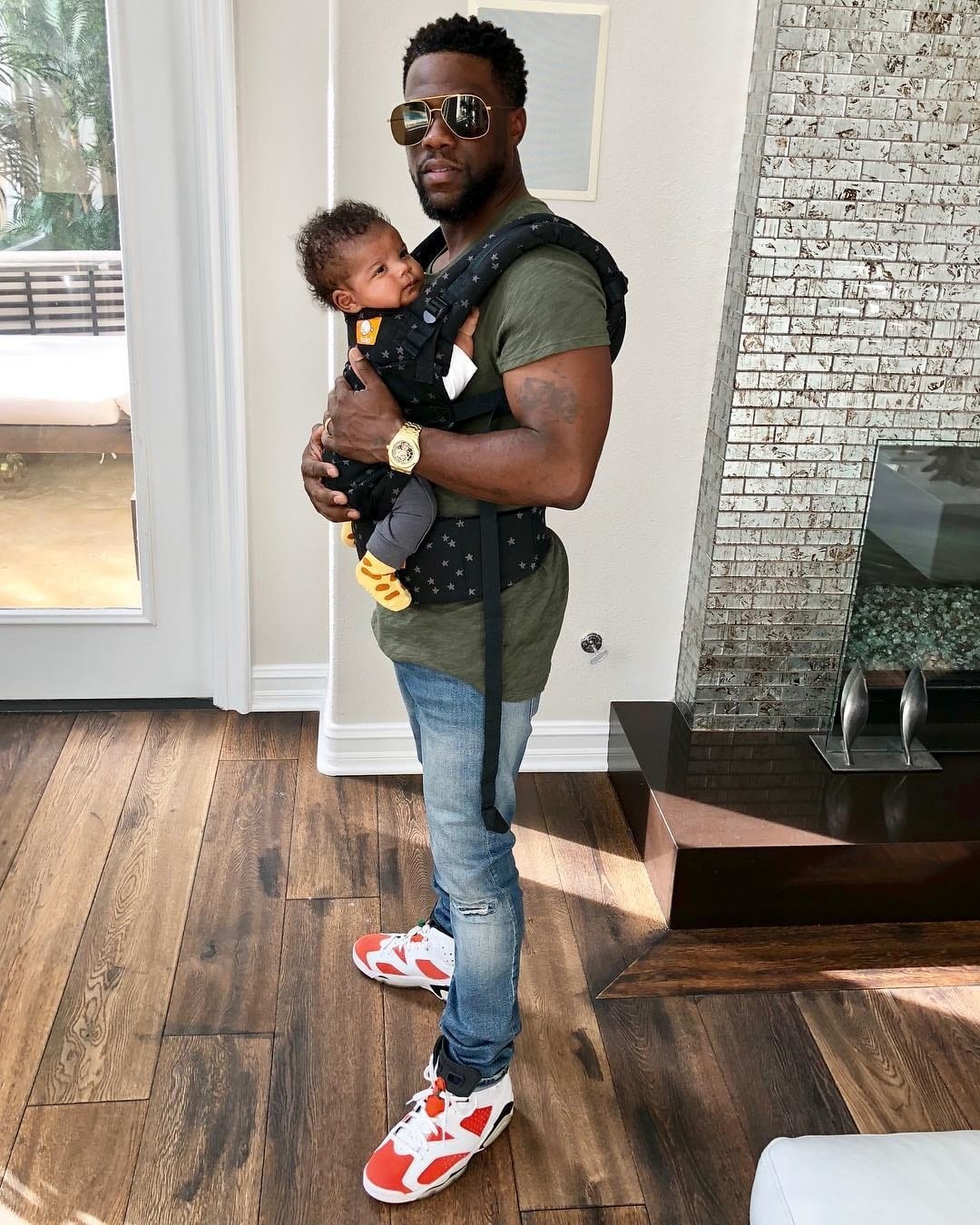 There is nothing more masculine than babywearing—and these celebrity dads prove it