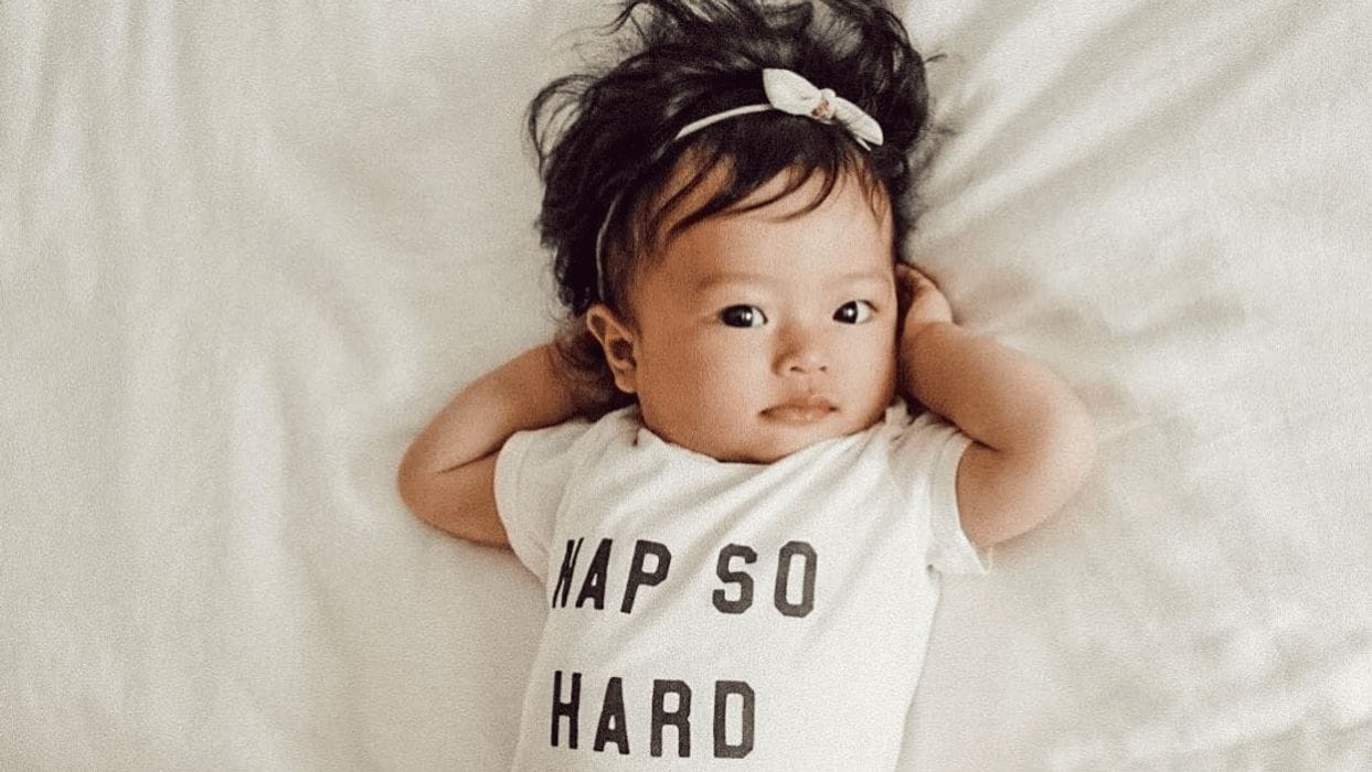 The top 40 trending baby names of 2018—so far little-girl-laying-on-a-bed