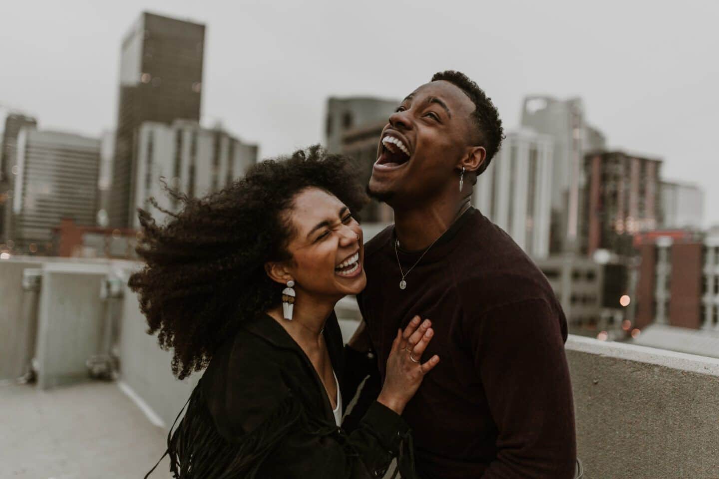 What a clinical therapist wants you to know about couple’s therapy couple laughing together