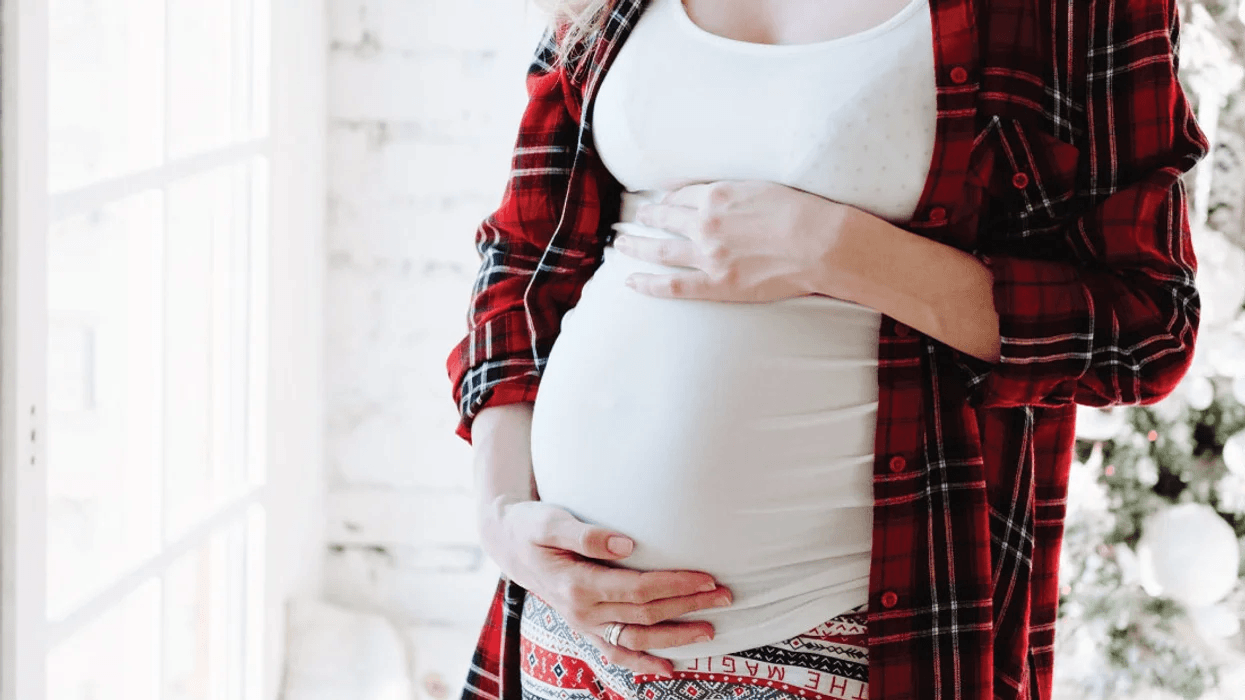 16 incredible holiday gifts every pregnant mama needs pregnant woman holding belly