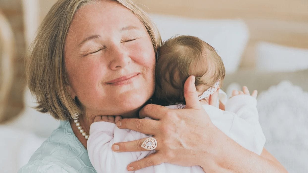 Being a grandmother is the greatest joy of my life grandma hugging newborn baby
