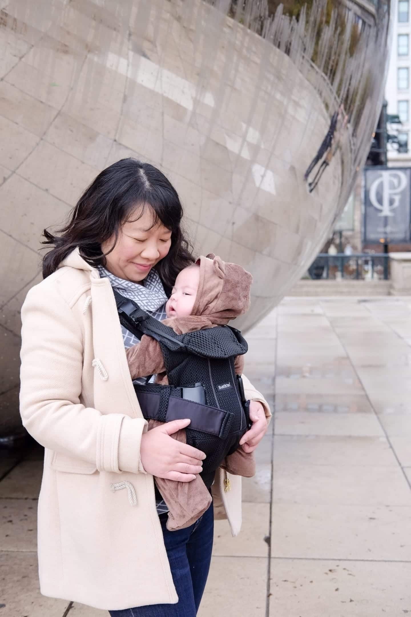 Visiting Chicago: Your travel guide for kid-friendly destinations mom wearing her baby in chicago
