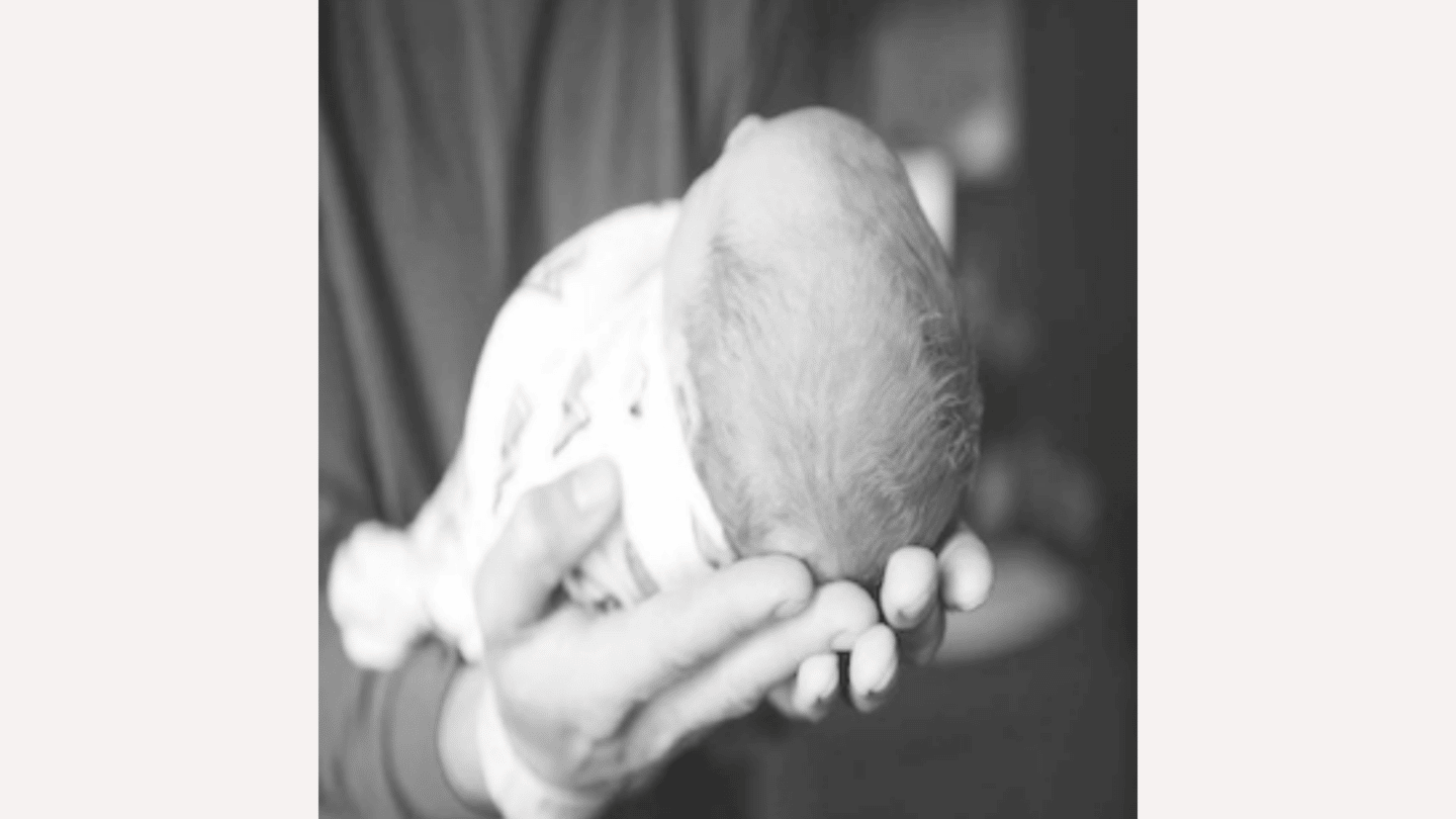 Kelly on postpartum depression and feeling like a sh*tty mom baby being held