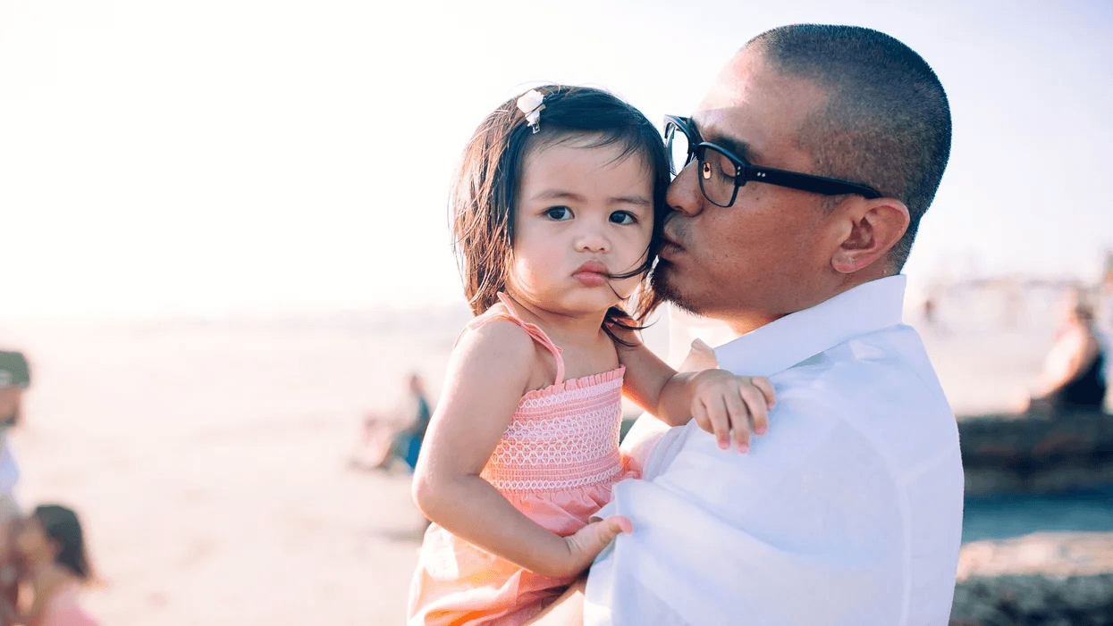 7 vital lessons for teaching kids how to manage their emotions dad kissing daughter
