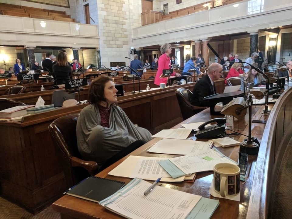 Nebraska state senator makes history breastfeeding on Legislature floor nebraska state senator first to breastfeed on legislature floor featured - Motherly
