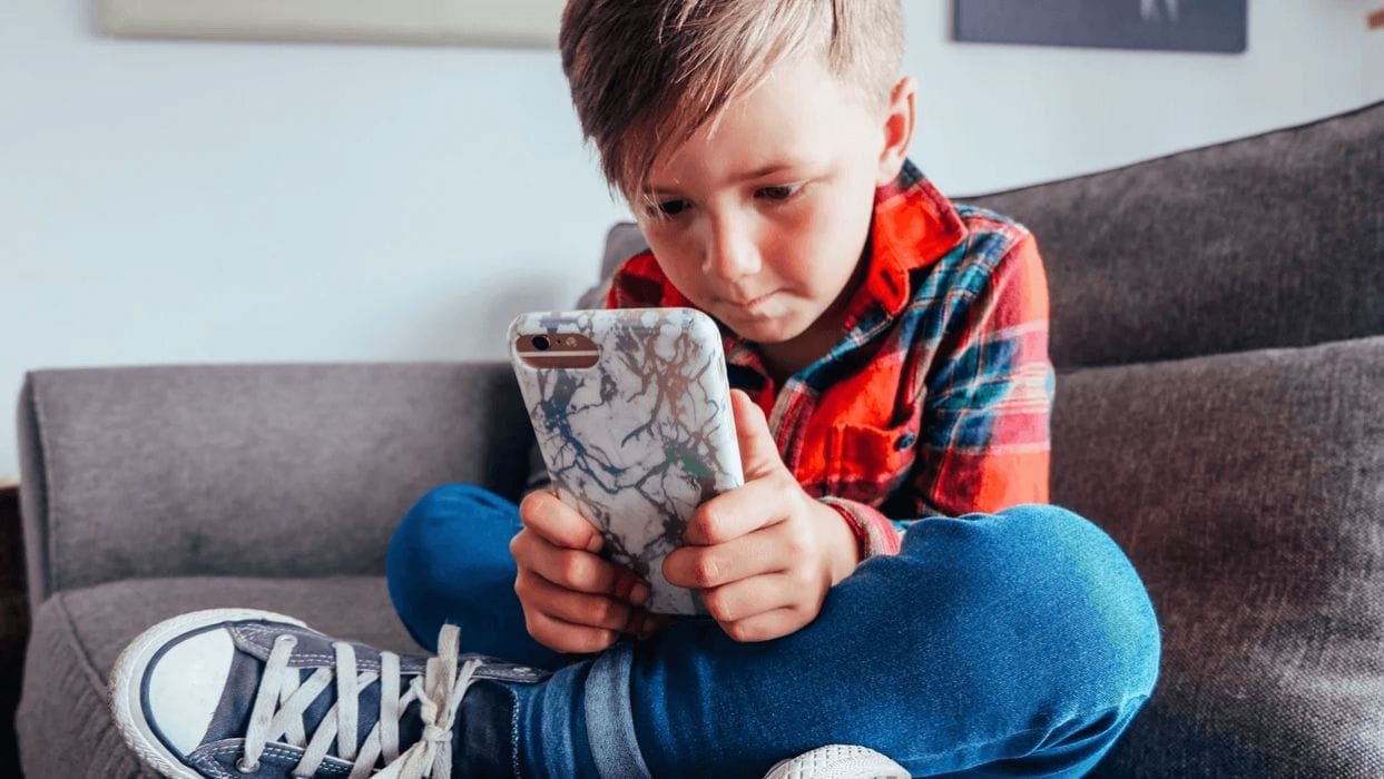 The ‘Momo challenge’ isn’t real, but the concerns it raised are young boy playing on phone