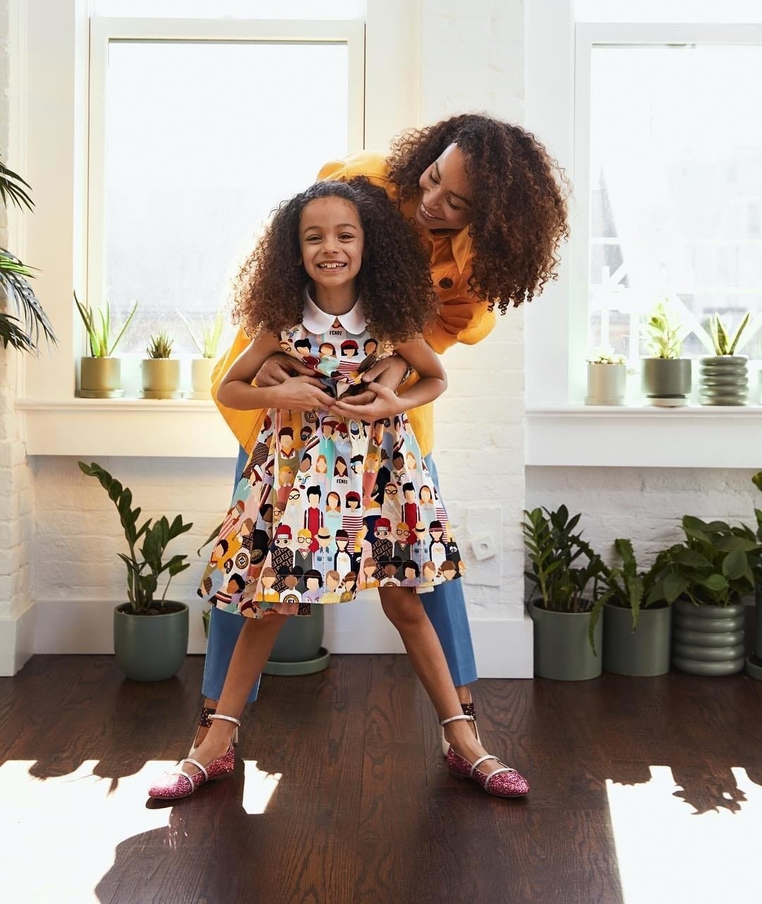 Why renting kids clothes could save your style + budget, mama a woman and a girl posing for a picture