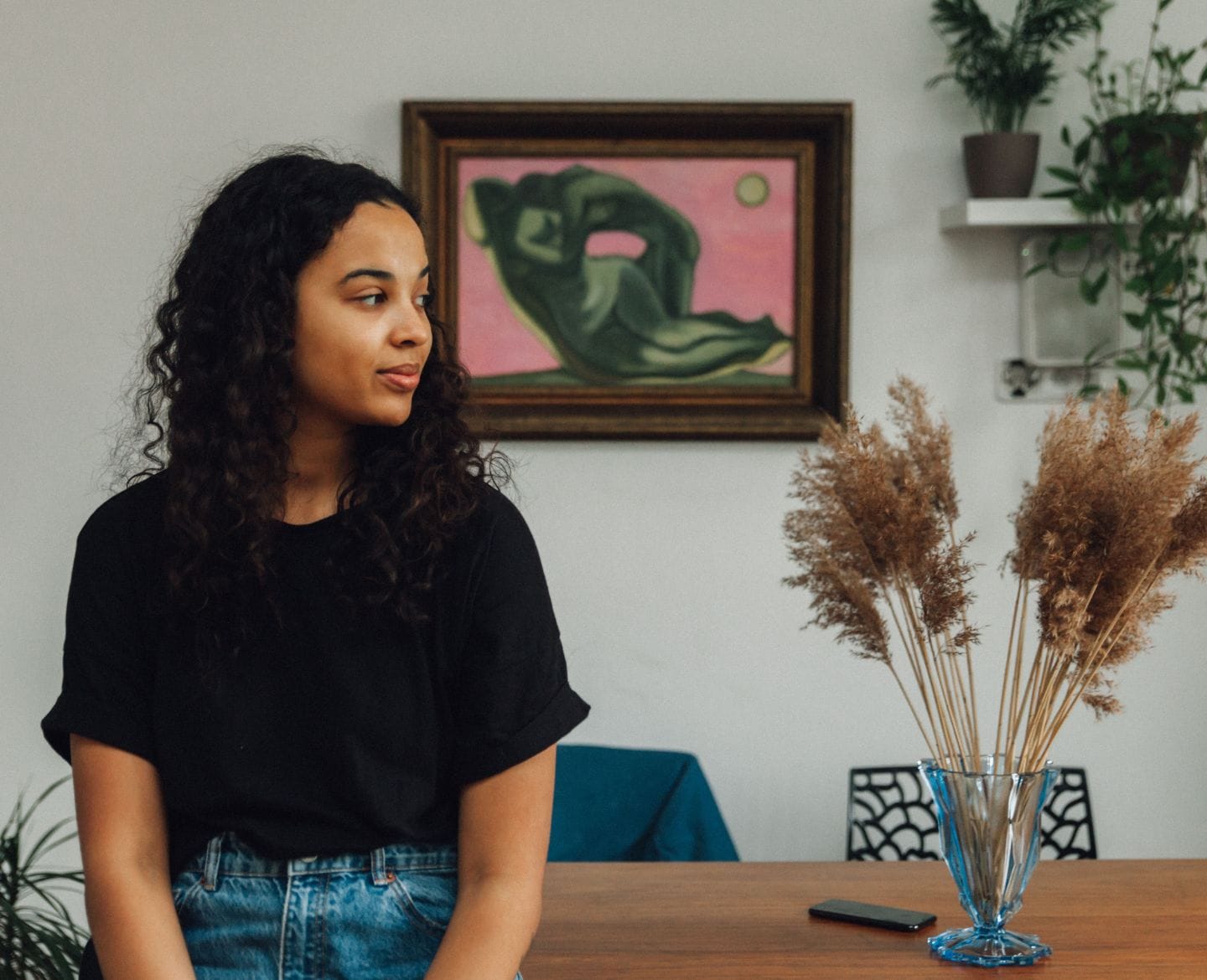 10 facts about the state of abortion in America right now woman at home sitting on dining table looking away