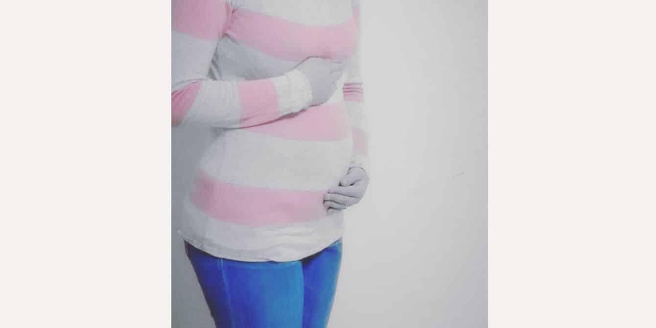 Oriana on prenatal and postpartum OCD and intrusive thoughts pregnant mother holding belly but dealing with intrusive thoughts
