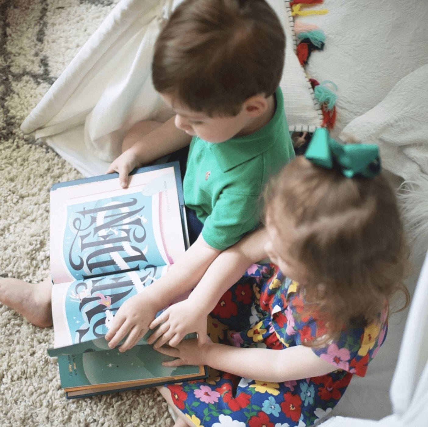 Watch out Amazon—Hullabaloo Book Company is here 📚 siblings reading a book together
