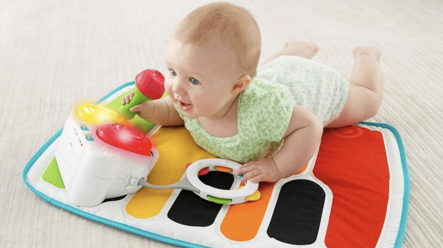 Head to Walmart.com for savings on items that help you multitask, mama child playing on playmat