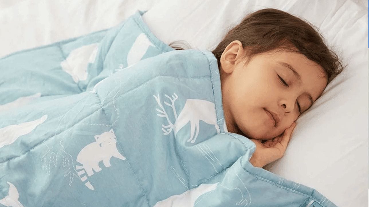 My toddler *finally* slept through the night thanks to this toddler sleeping with a weighted blanket