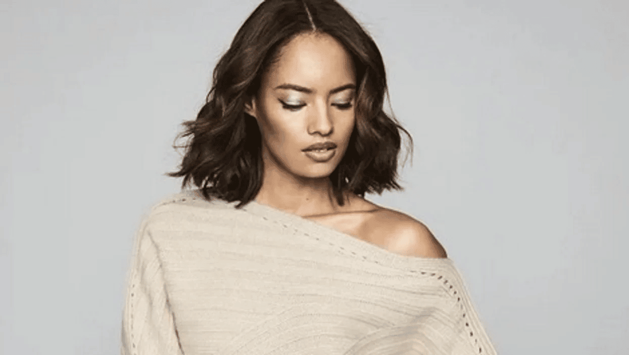 Top fashion trends from NYFW that mamas can wear right now woman wearing an off-the-shoulder sweater