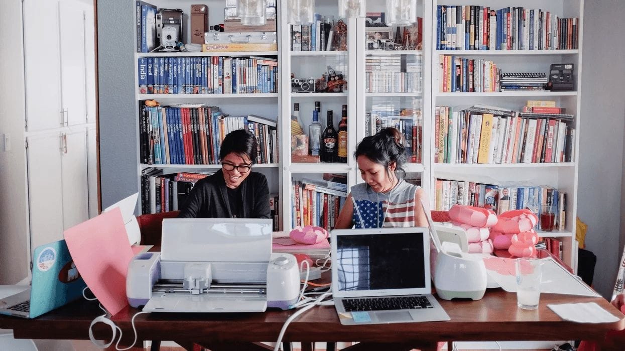 8 expert tips for setting up a home office that *actually* works for you two woman working in a home office