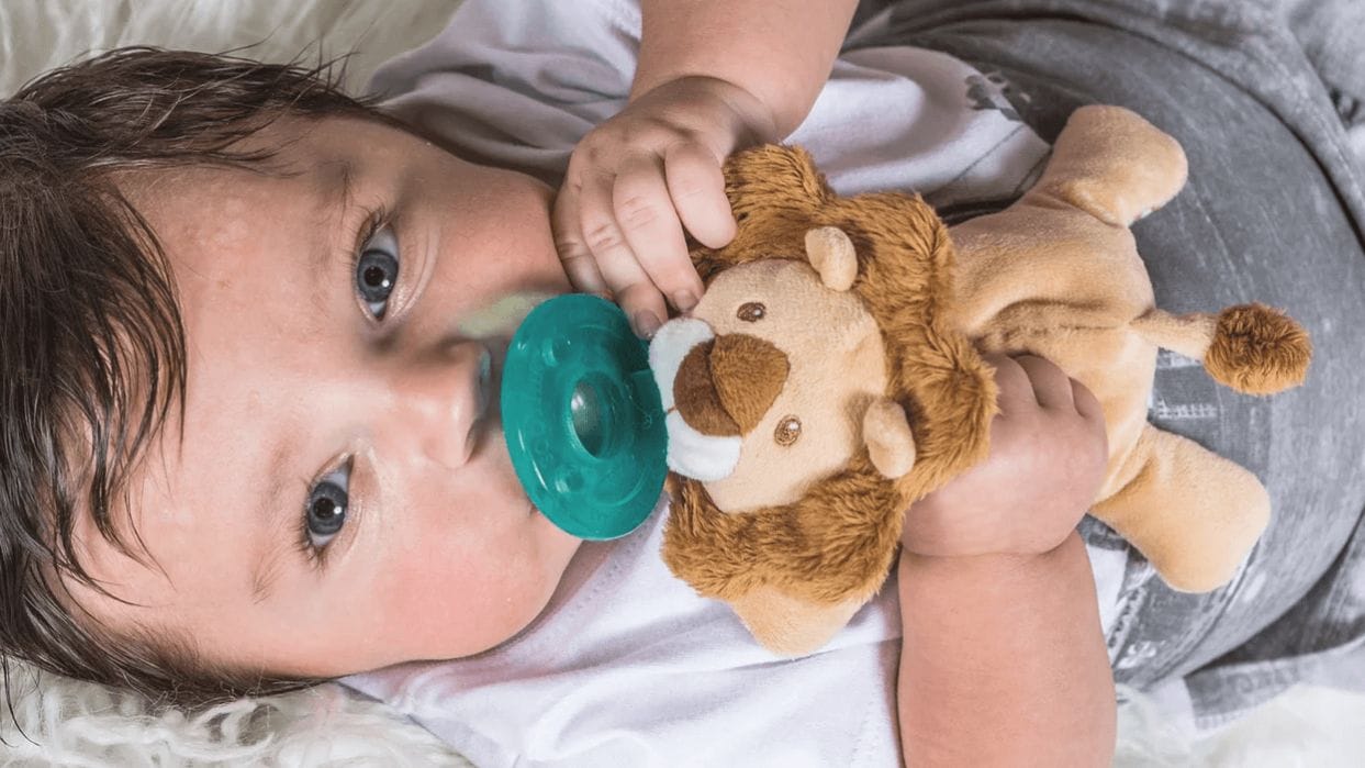 My baby is no longer a baby baby with a wubby pacifier