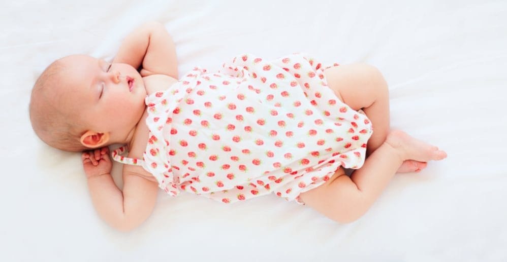 6 reasons August babies are special baby in strawberry summer outfit - august babies