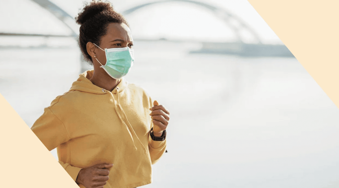 Is it safe to exercise with a face mask on? What to know, mama woman running with a face mask