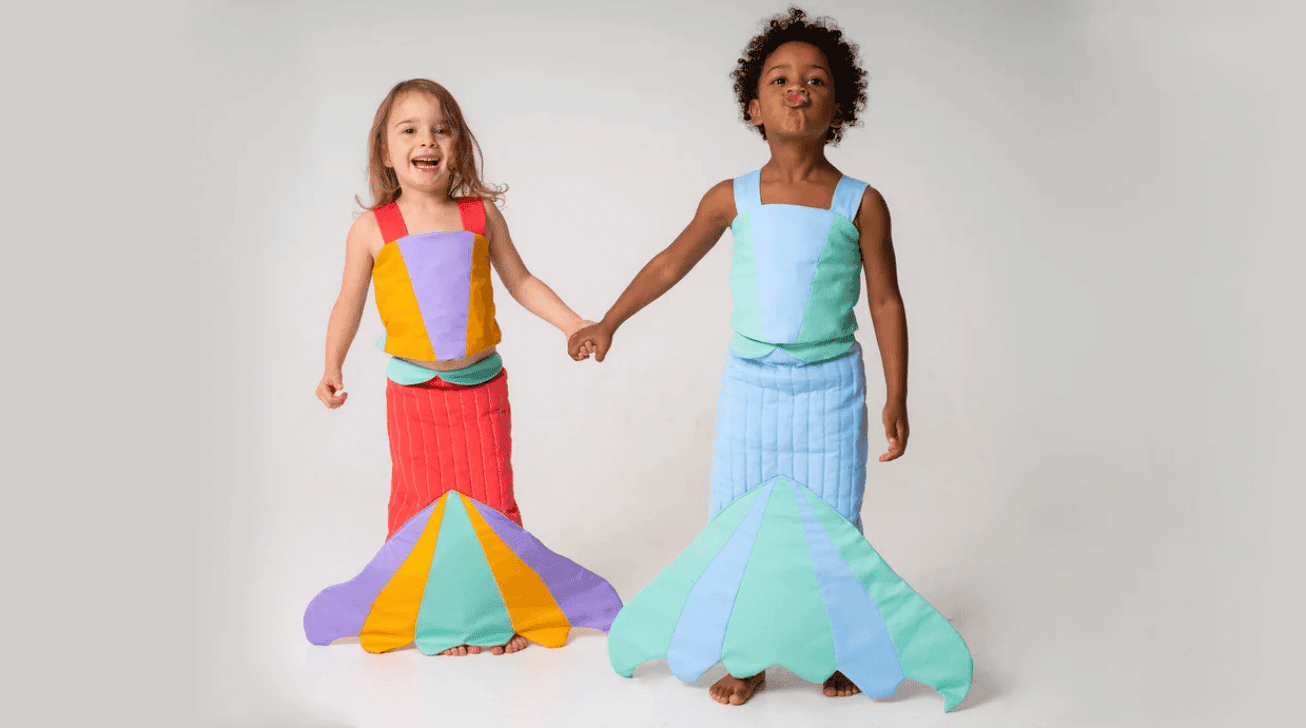 Costumes your kids will want to wear all year long two girls wearing mermaid costumes