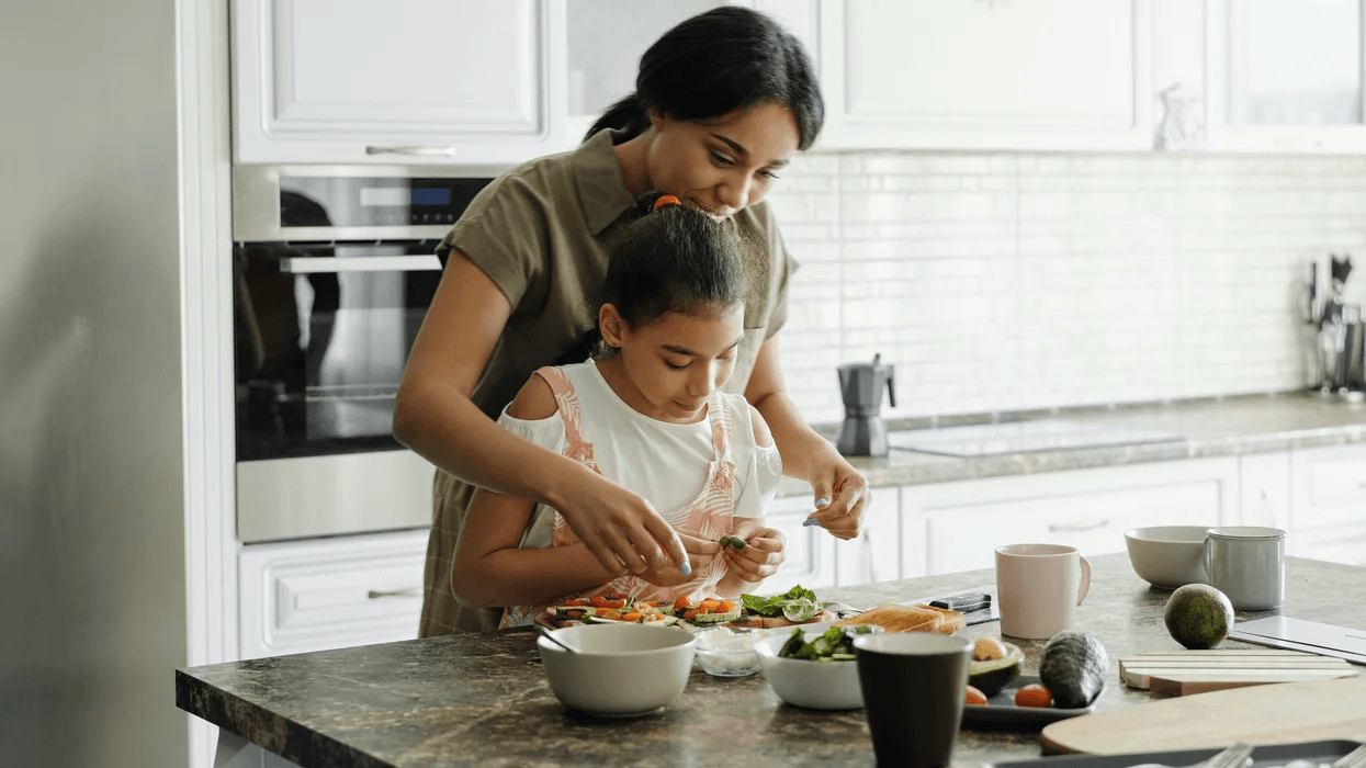 13 TikTok recipes that will get you excited about cooking again woman cooking with daughter