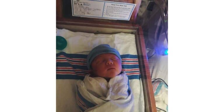 Kayleigh on her anxiety about giving birth during a pandemic baby swaddled in a hospital - essay about giving birth during a pandemic