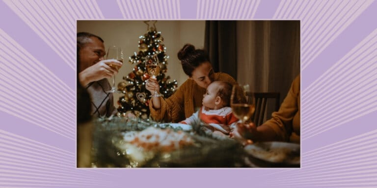 10 essential rules for visiting a newborn during this holiday season An image of a happy family around a Christmas tree