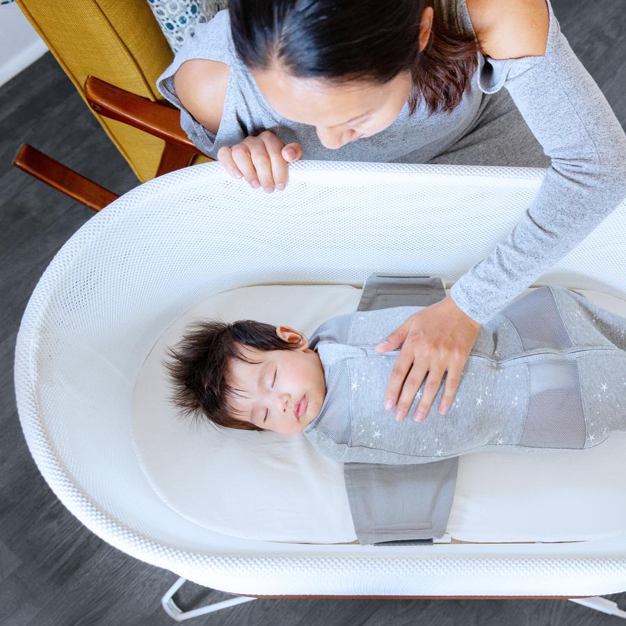 Deal alert: The SNOO is 35% off for Black Friday! mom watching a baby sleep in a snoo - shop the snoo sale
