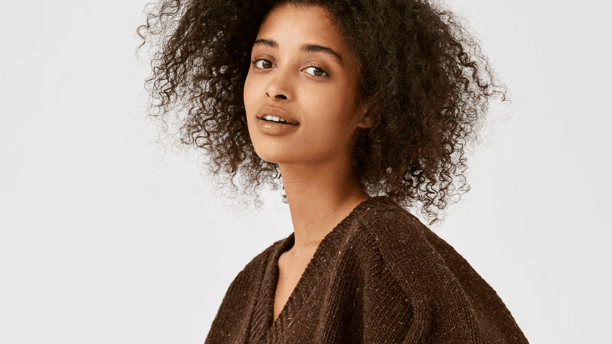 I usually go bananas on Cyber Monday, but this year I’m only buying this one thing woman wearing babaa sweater