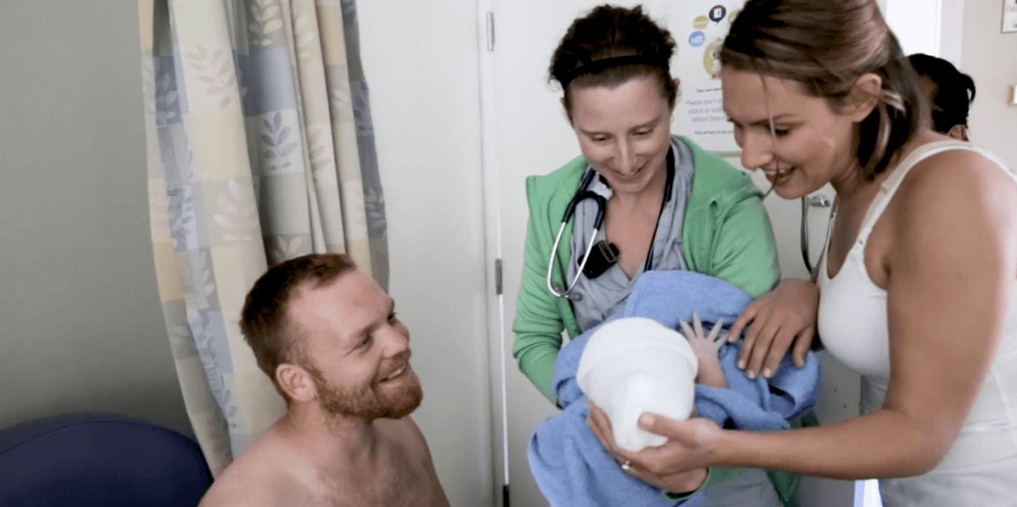 This is birth: An adoption journey parents being handed baby in a hospital