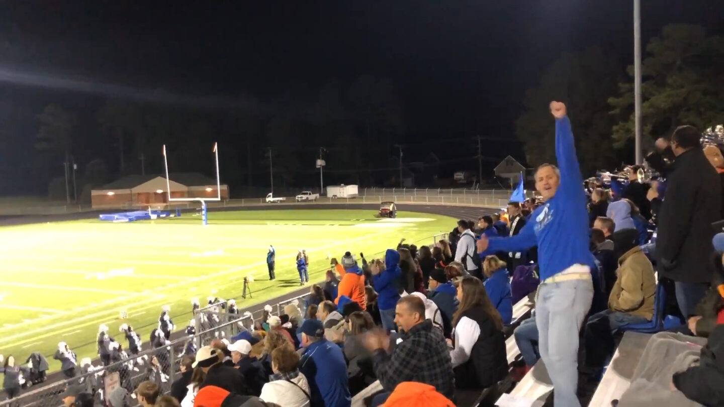 Viral video of dad rooting for his cheerleader daughter dad cheering on daughter at a football game